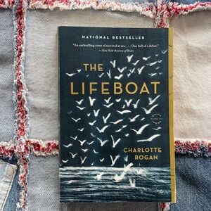 The Lifeboat by Charlotte Rogan - Navy & Gold Paperback